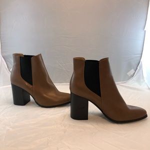 Never worn, size 10 brown heeled booties with tags